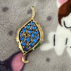 Gold and Blue Gemstone Brooch